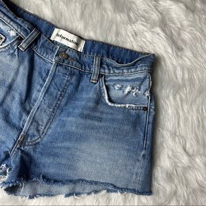 Reformation | Distressed Raw Hem Mid Wash Denim High Rise Jean Shorts 26